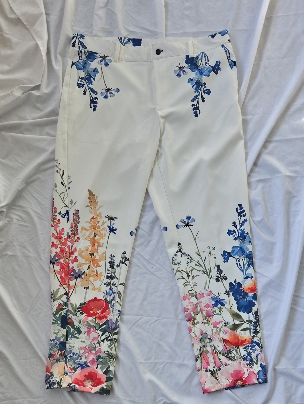 Men's White Pants That Celebrate The Beauty Of Flowers Printed In The Fabric
